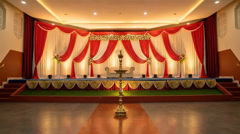 Stage in red and white with traditional brass lamp